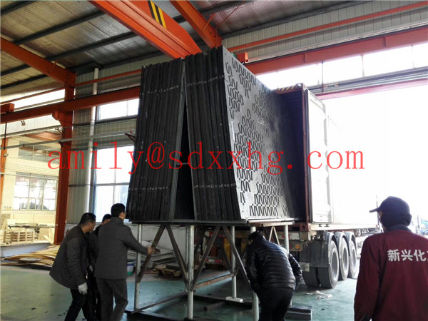 loading containers for temporary road mats